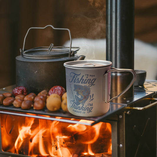 EtchStudio 450ml Titanium Camping Mug with Lid & Mesh Bag – “I’m Not Fishing, I’m Thinking About It”