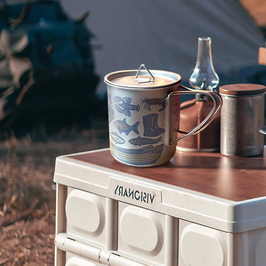 450ml pure titanium camping mug with lid & mesh bag. Blank surface ready for custom engraving. Ultralight, durable, odor-free—ideal for hiking & daily coffee.